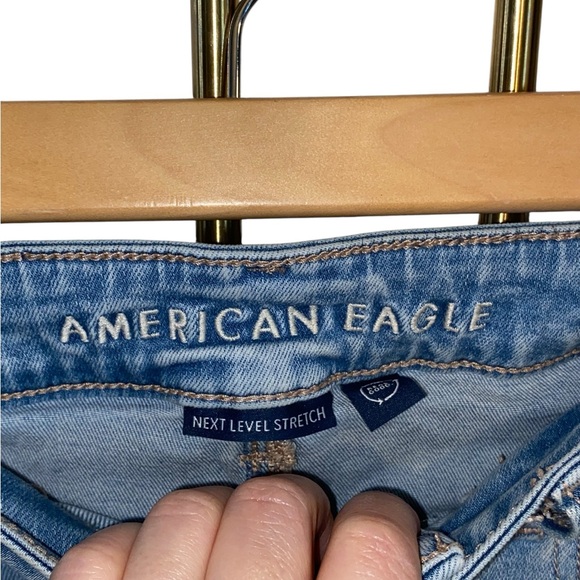 American Eagle Next Level Ripped Super High-Waisted Flare Jeans light blue - Picture 8 of 10